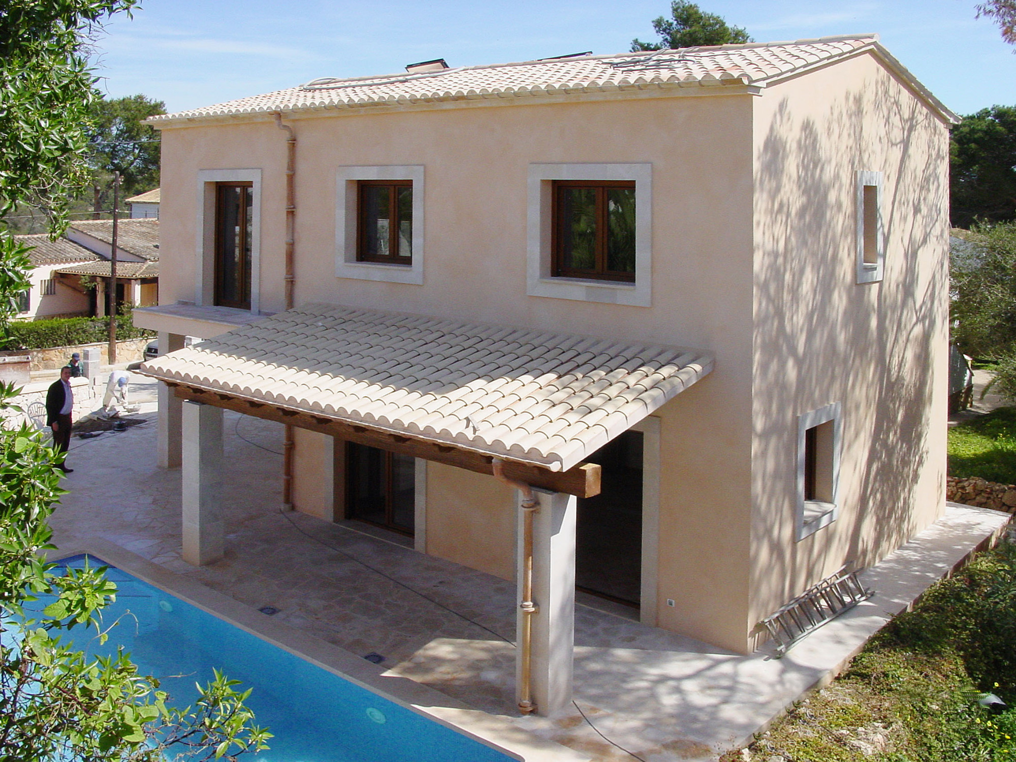 Rear view with covered terrace and pool